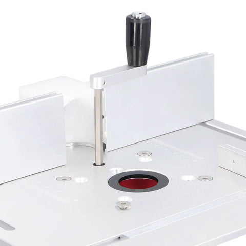 Built Different Router Table Combo Kit Featuring Smooth Zero To Fifty Four Millimeter Lift System With Comfy Grip Insert Plate And Rock Solid Clamping Setup For Workshop Addicts And Precision Trim Daily, showing insert plate with adjustable lift.