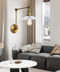 Top Tier Adjustable Swing Arm Wall Sconce With Hand Blown Glass Shade And Hella Bright Up Down Ambient Glow E27 Bulb Suits Bedroom Bedside And Study Reading In Cool Green Bronze mounted in modern living room.