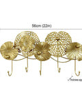 Gold Wall Mounted Coat Rack Featuring A Styled Lotus Leaf Design With Five Heavy Duty Hooks To Hang Outerwear Keys Caps And Towels A Total Game Changer For Entryway Organization That Keeps Your Daily Carry Tight And Zero Drama - Dimensions 56cm x 29cm.