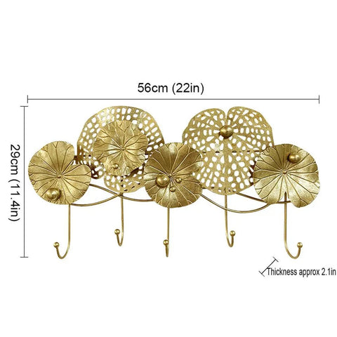 Gold Wall Mounted Coat Rack Featuring A Styled Lotus Leaf Design With Five Heavy Duty Hooks To Hang Outerwear Keys Caps And Towels A Total Game Changer For Entryway Organization That Keeps Your Daily Carry Tight And Zero Drama - Dimensions 56cm x 29cm.