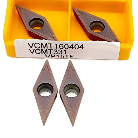 Premium Carbide External Turning Insert For Metal Machining VCMT160404-MA CNC Lathe Tool in a yellow case.