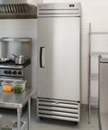 Top Tier One Door Commercial Reach In Freezer With Slick Stainless Steel Body And Smooth Riding Casters Crafted For Relentless Restaurant Crews Serving Up Pristine Frozen Goods Without Any Gremlins Or Complicated Hookups UL Certified 27 Inch Wide 115V in commercial kitchen setting.