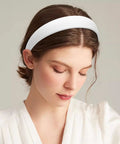 Wide 1 Inch Ultra Soft PU Leather Headband For Women Girls Comfortable Padded worn by a woman with light makeup and white top.