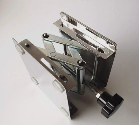 Angled view of stainless steel lab jack lift stand with 8x8 in platform and screw clamp