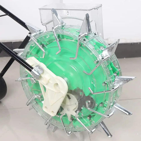 Walk-Behind Broadcast Spreader And Roller Seeder with 12 Seed Plates, close-up of spiked wheel design for home garden use.