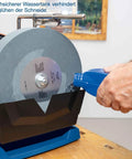 Heavy Duty Workhorse 150W Water Cooled Bench Sharpener with rugged induction motor, water tank pouring coolant to prevent heat damage.