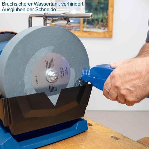 Heavy Duty Workhorse 150W Water Cooled Bench Sharpener with rugged induction motor, water tank pouring coolant to prevent heat damage.