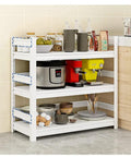 Rock Solid Three Tier Steel Shelving Unit With Fully Adjustable Boltless Racks For Garage Pantry Kitchen Organization White Heavy Duty Storage Rack Simple Setup holding kitchen appliances and dishware.