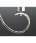Detail view of Four Light Pendant In Brushed Nickel Finish With White Silk Mylar Shade, focusing on elegant metal swirl design.