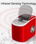Fast Freeze Countertop Ice Maker Produces Nine Fresh Cubes In Eight Minutes with open lid and ice ready in bright red design.