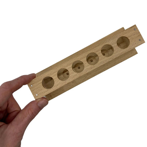 Small Wooden Test Tube Rack For Six 15mm Tubes 6 Inch Long 2.7 Inch Tall Unfinished Oak Construction held in hand