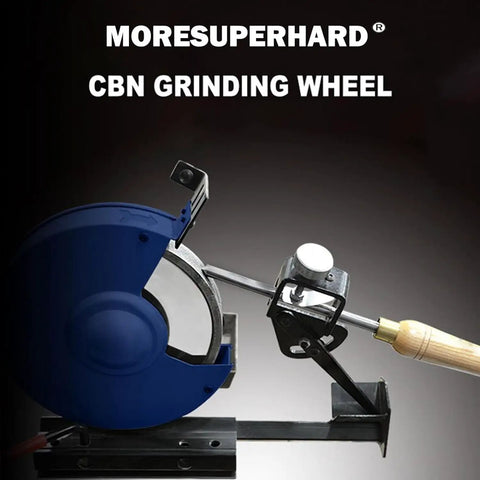 Sharpen Old Blades With This Badass CBN Grinding Wheel Built For Razor Precision Six Inch Face Width Half Inch Arbor Fits HSS Bits Lathe Chisels Woodturners And Standard Bench Grinders While Delivering Butter Smooth Cuts Zero Vibration Guaranteed; blue CBN grinding wheel with sharpening fixture.