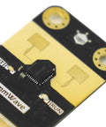 Close-up view of MmWave Presence Sensor C4001 24GHz module for human detection, featuring dual gold contact points and chip components.
