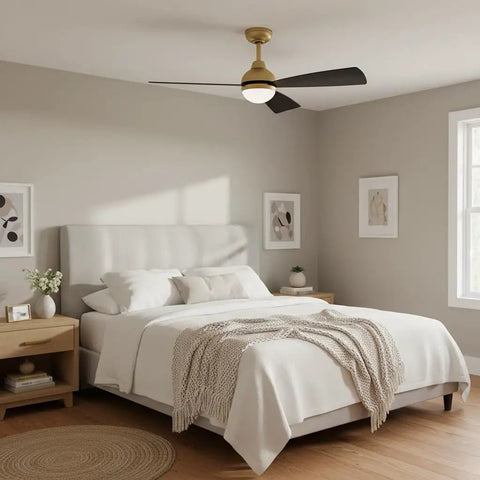 Bedroom with 44 Inch Indoor Outdoor LED Smart Ceiling Fan, 3 Blade Propeller, Heritage Brass and Matte Black, Scandinavian Style, installed above bed