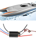 70A Brushless RC ESC Waterproof With Built In BEC For RC Boats And Airships for real hobbyists, shown beside RC boat