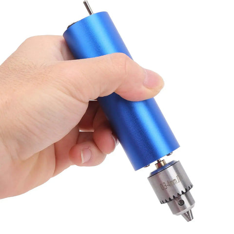 Hand holding Go To Portable Electric Hand Drill Kit For Wood Crafting And Polishing, Aluminum Alloy Mini Drill, side view