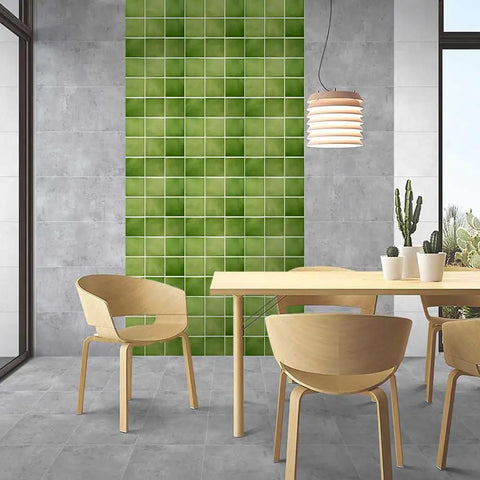 Green 3D Peel And Stick Tile Backsplash Squares 11.8x11.8 Inches Ultralight PVC on interior wall behind modern dining setup.