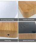 Close-up of levitating moon lamp base with wood grain finish, 3D printed moon surface, power plug, and bottom slowing pad.