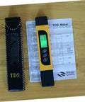 Handheld Water Tester Digital Pen For Total Dissolved Solids And PH with display, case, and instructions on wooden surface.