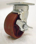 Heavy Duty Five Inch Swivel Casters With Kingpinless Design And Ductile Steel Wheels delivering smooth rolling action. Close-up view.