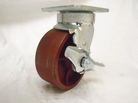 Heavy Duty Five Inch Swivel Casters With Kingpinless Design And Ductile Steel Wheels delivering smooth rolling action. Close-up view.