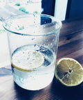 Glass Beaker Set With Magnetic Stir Bar For Lab Use Five Sizes 50mL 100mL 250mL 500mL 1000mL 3.3 Borosilicate with lemon slice