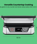 Chefman 5-in-1 Digital Panini Press Grill And Sandwich Maker in stainless steel, 13.1 x 7.3 x 13 inches, with adjustable LCD display.