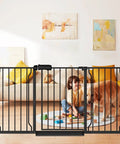 Child and dog behind Extra Wide Baby Gate 53 to 57.5 Inches Black Pressure Mounted No Drill Auto Close Gate for Stairs Doorways and Hallways.