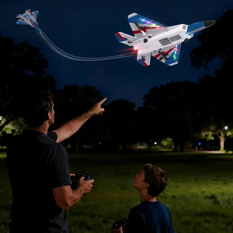 Two people operating 4 Channel F22 Raptor RC Plane RTF With LED Lights under night sky, highlighting aerobatic flight.