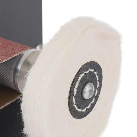 Heavy Duty Brushless Belt Sander With Hella Fine Tune Speed Dial For Sweeter Wood And Metal Grinding Projects Delivering Zero To Ten Thousand RPM Power Output Anywhere - close-up of polishing wheel.
