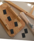 Heavy Duty Stainless Steel Corner Braces on a wood surface with screws, ideal for cabinets and shelves reinforcement.