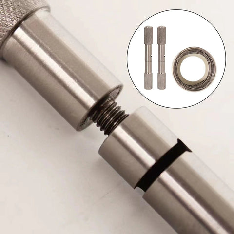 Close-up of manual camping rope and dehorning wire with handles for animal handling and outdoor gear.