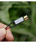 3V Mini Vibration Motor Ultra Compact 8mm By 14.5mm With Copper Eccentric Vibrator held in hand