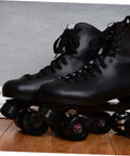 Black quad roller skates showing Two Pack Roller Skate Brake Stopper Toe Stops for Quad Skates Replacement Parts Durable High Elastic Rubber Brakes Deliver Stable Braking for Indoor and Outdoor Skating on wooden floor