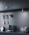 Smart Motion Sensor For Home Automation With Group Control Over Unlimited Devices installed in modern kitchen