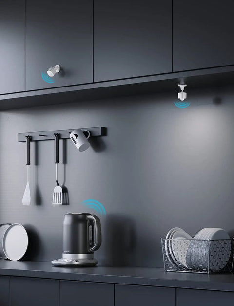 Smart Motion Sensor For Home Automation With Group Control Over Unlimited Devices installed in modern kitchen