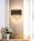 Dope Modern Crystal Wall Sconce With 2 E12 Sockets, 3-Tier Crystal Drops, Gold Finished Shade mounted on beige wall