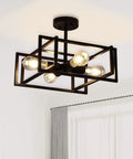 Slick Black 4 Light Ceiling Fixture, Industrial Farmhouse Flush Mount Chandelier with cube cage, shown in modern bedroom.