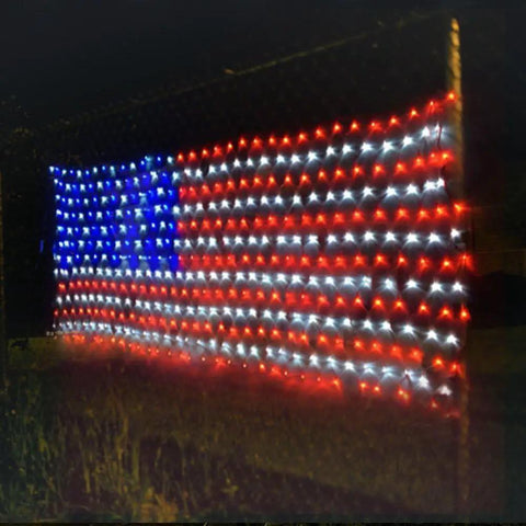 Patriotic LED Flag Net Lights For Outdoor Decor 6.5ft By 3.2ft Waterproof American Flag String Lights glowing at night