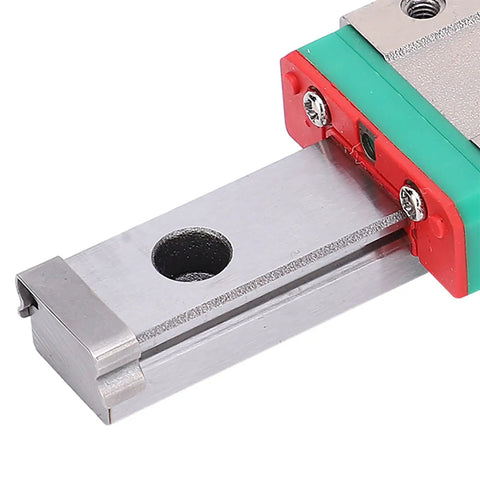 Close-up of 100mm Stainless Steel Linear Guide Rail For CNC And 3D Printers with red and green slide block showing precision engineering