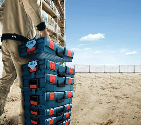 Man carrying 30 Piece Organizer Set For iBOXX72 Click And Go Mobile Transport System In Blue And Red Fits 72mm Depth