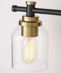 Close-up of Vintage Two Light Bathroom Wall Sconce In Black Brass With Clear Glass showcasing bulb and brass details