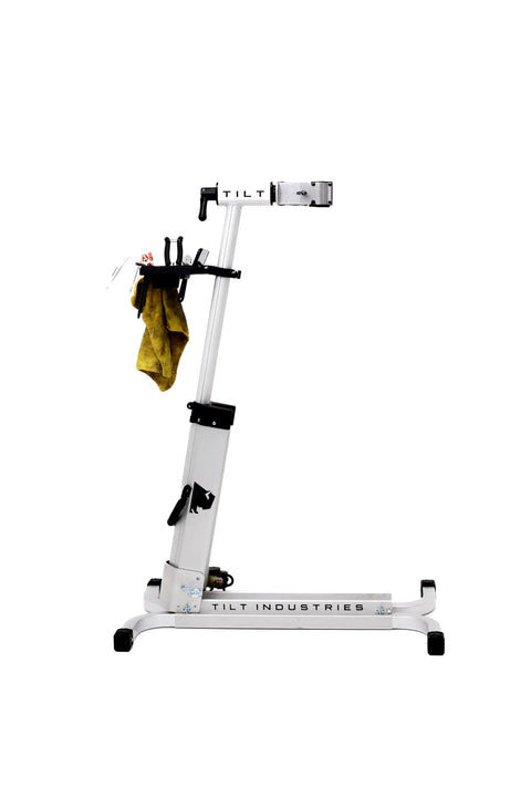 Side view of a silver repair stand with attached yellow rag, part of Universal Bicycle Repair Stand Tool Tray With Adjustable Work Surface.