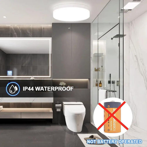 Remote Controlled Dimmable Flush Mount LED Ceiling Light in modern bathroom, IP44 waterproof, not battery operated.