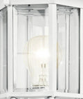 Close-up of Coastal White Outdoor Wall Light with Clear Beveled Glass showing bulb and 17 inch tall frame detail.