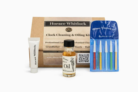 Pro Grade Clock Oil Kit For Cleaning And Lubing Movements with tools, oil, and cloths in packaging.