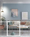 Extra Wide Baby Gate 65 To 68 Inches Walk Through Doorway Gate For Kids And Pups in a modern living room setting