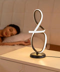 Sleek Black Modern Table Lamp With Touch Control 17 Inch LED Dimmable Spiral Metal Desk Light 3 Color Temperature on nightstand