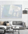 Barden 58 Inch Floor Lamp in Black Finish With Dark Gray Velvet Shade Rotary On Off Switch Sleek Minimalist Bridge Arm Lighting for Living Room and Reading Vibe next to a modern gray sofa and abstract wall art in a stylish living room.
