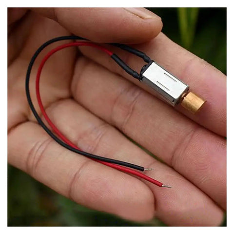 3V Mini Vibration Motor Ultra Compact 8mm By 14.5mm With Copper Eccentric Vibrator held in hand